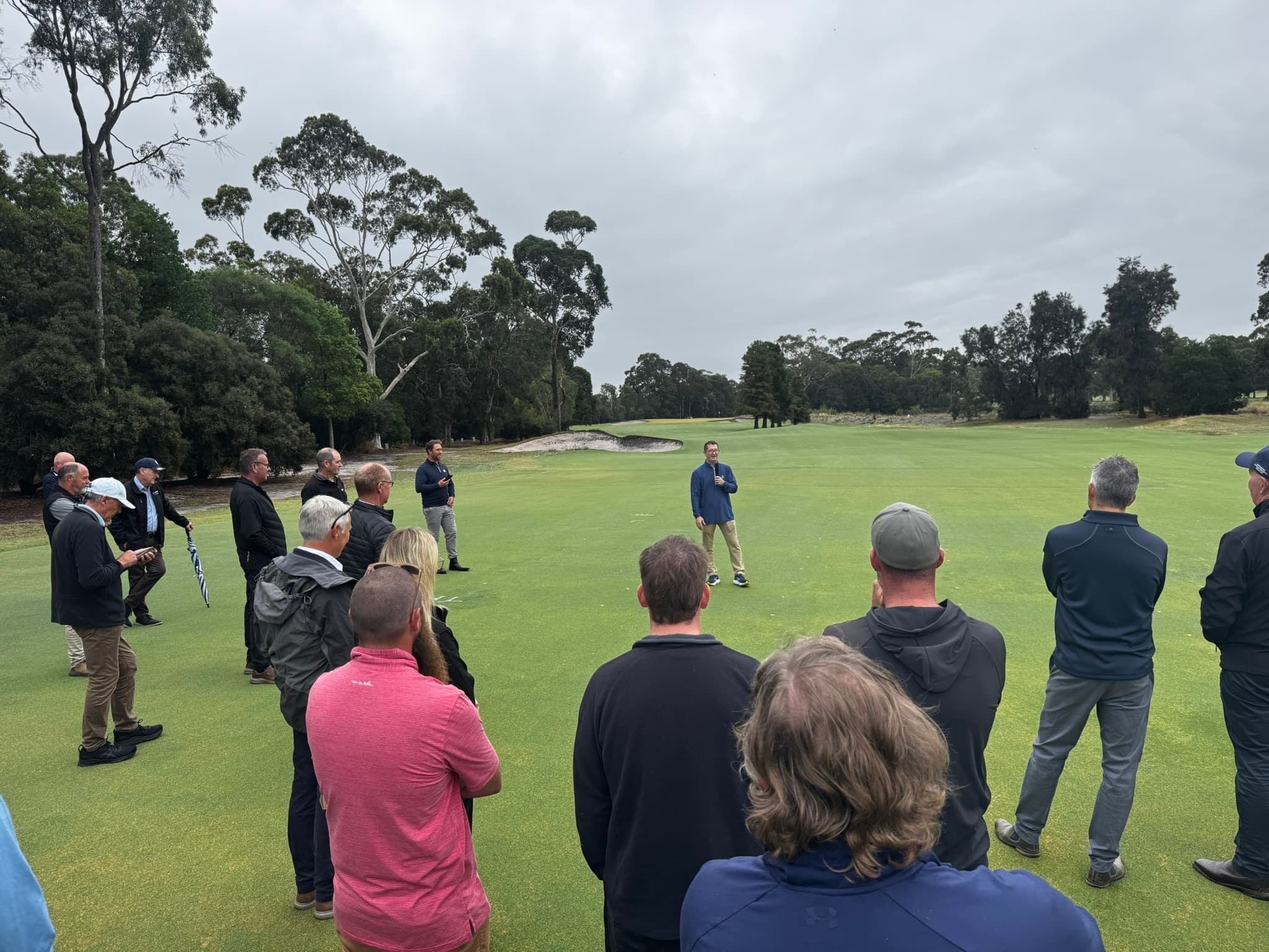 John Kaminski, Ph.D. in the field with golf course superintendents
